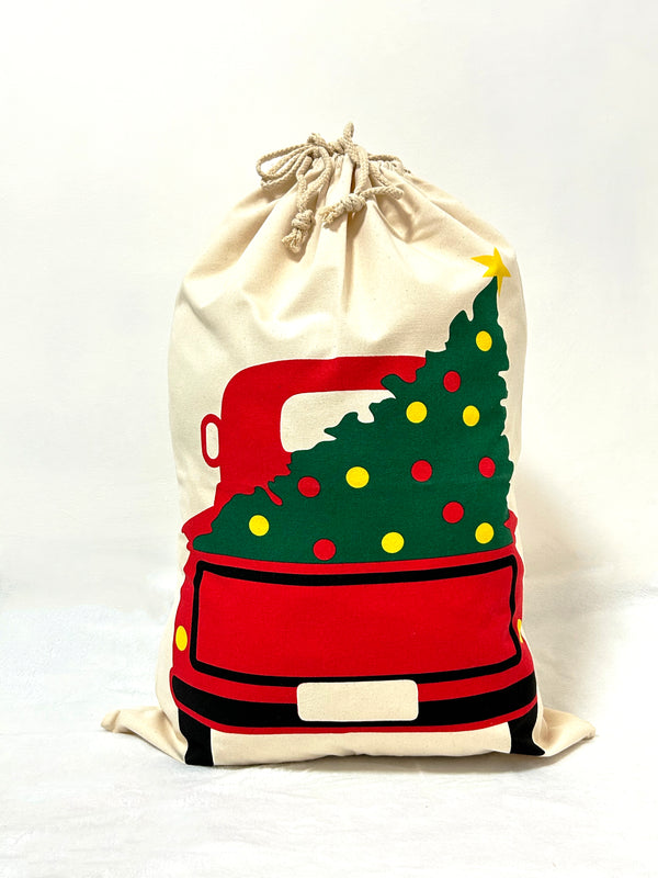 Picking up tree Christmas gift bag